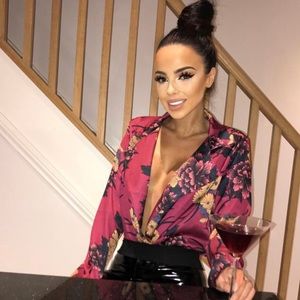 Floral silk bodysuit in burgundy